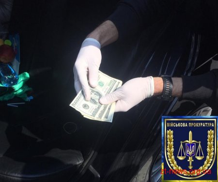 Військова прокуратура затримала голову Коростенської РДА з підлеглою на отриманні 1500 доларів хабара